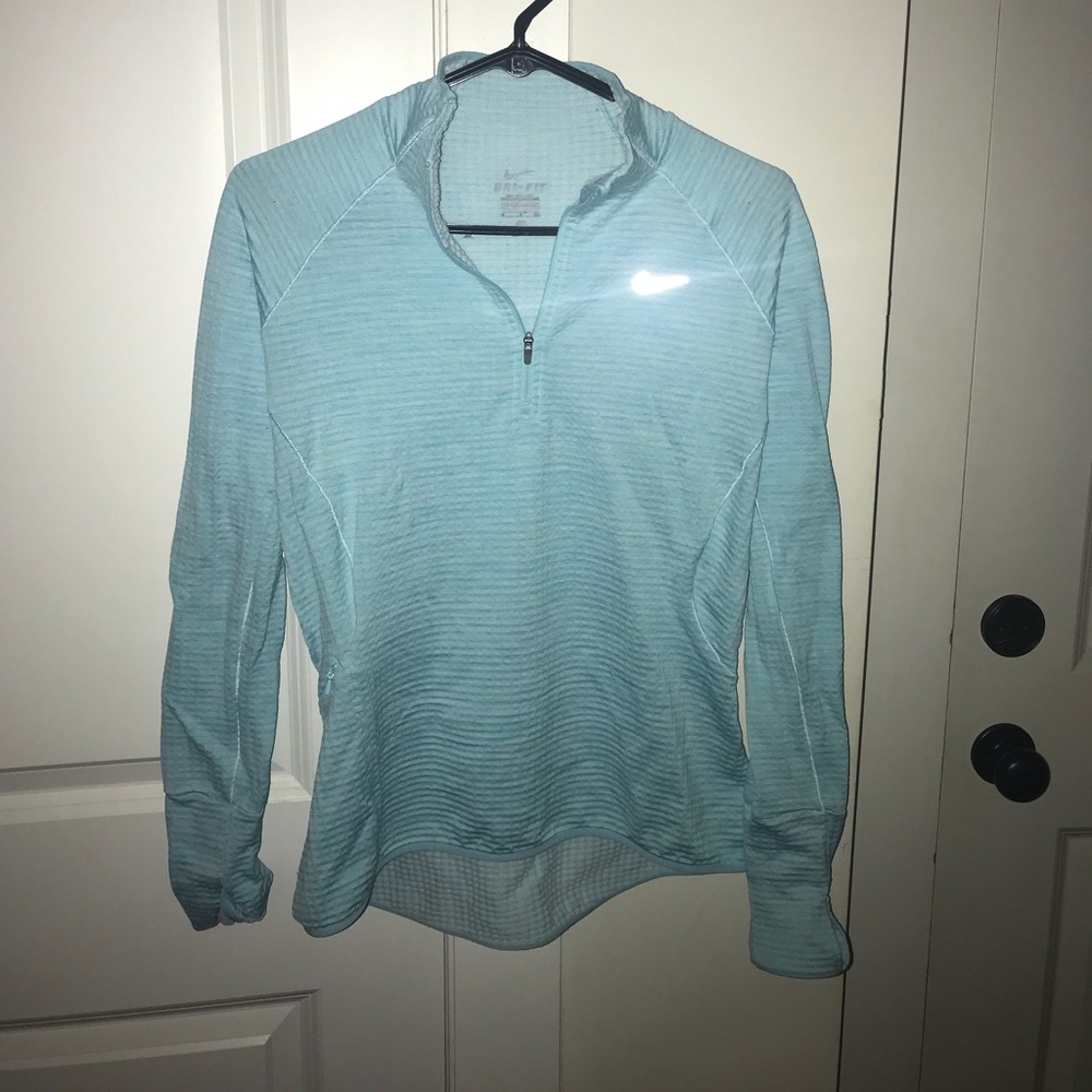 Light blue dry fit Nike pullover